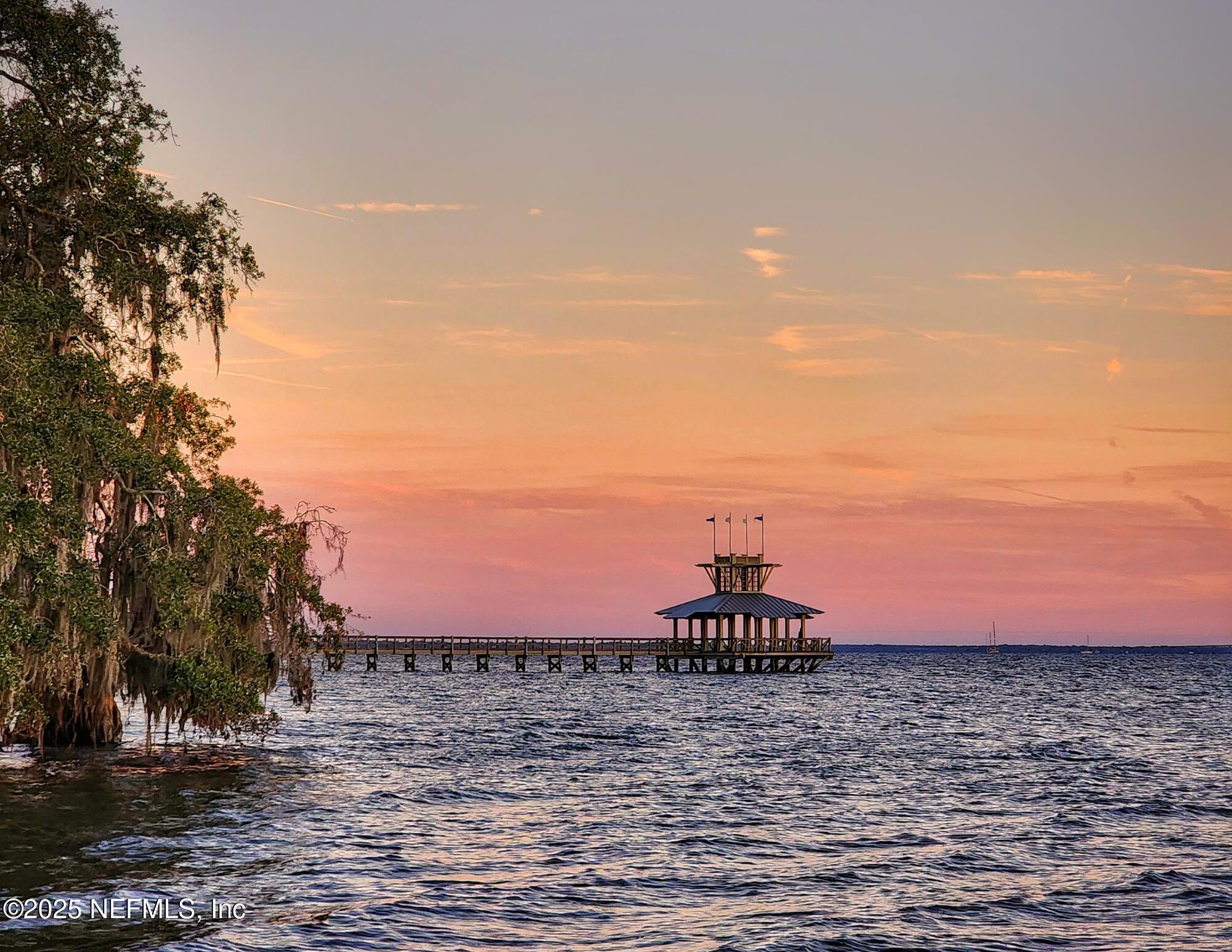 30 Cloverbrook Road St. Johns, FL 32259 - Photo 38 of 69 a view of a lake with a building in the background
