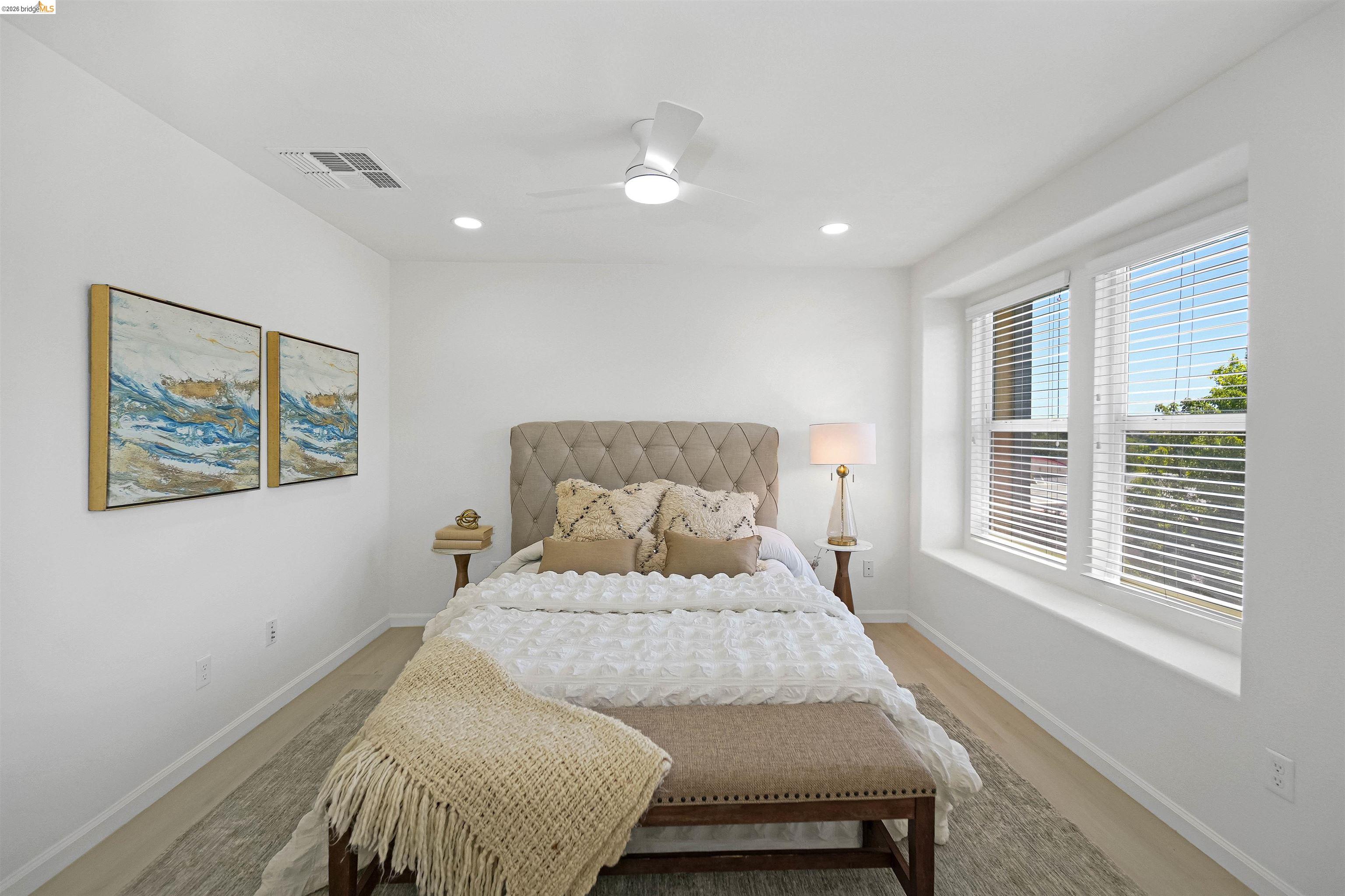 449 Constantine Court San Ramon, CA 94583 - Photo 42 of 63 Bright interior space featuring a multi-pane window, recessed lighting, a ceiling fan, and wood-finish flooring