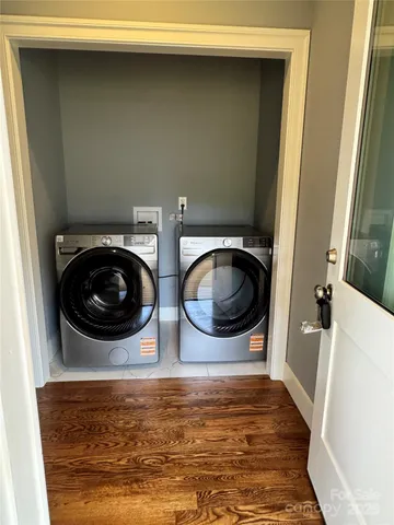 a bathroom with a sink a mirror and a shower