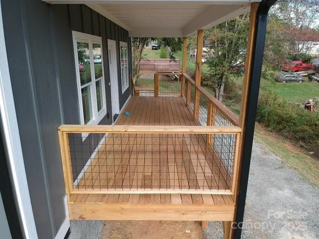 a view of backyard with tub