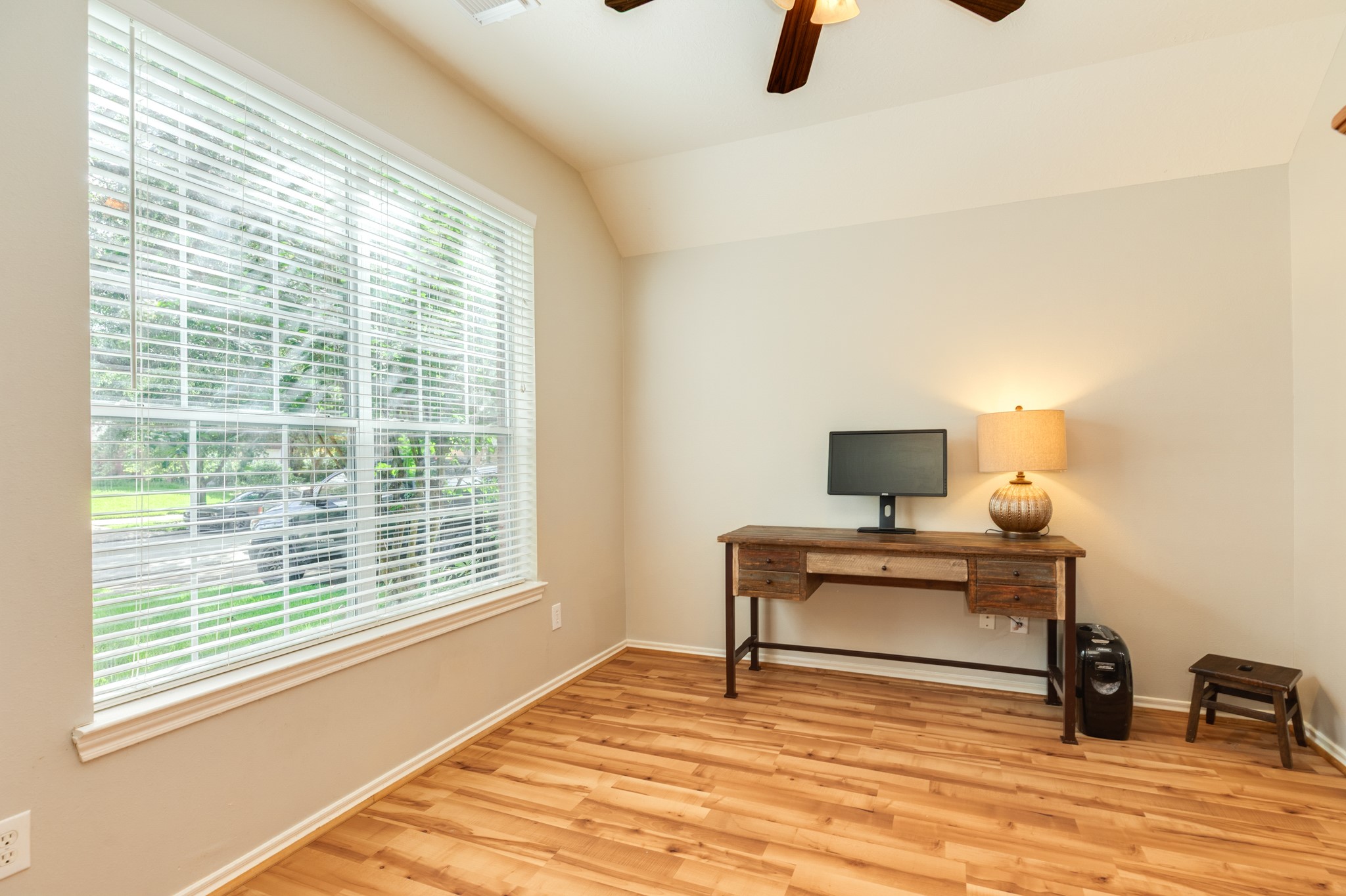 13808 Stark Bridge Lane Rosharon, TX 77583 - Photo 6 of 39 Spacious dining/bonus room featuring an oversized window that allows an abundance of natural light to flow through the entire space, creating a bright and inviting atmosphere perfect for entertaining or relaxation.