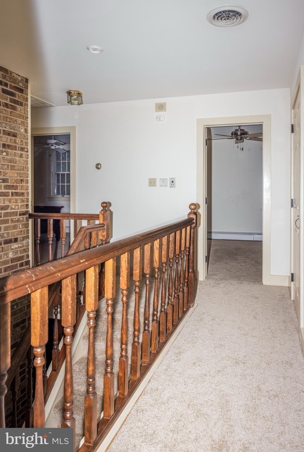 8132 Covered Bridge Road Quakertown, PA 18951 - Photo 11 of 17 a view of hallway with stairs