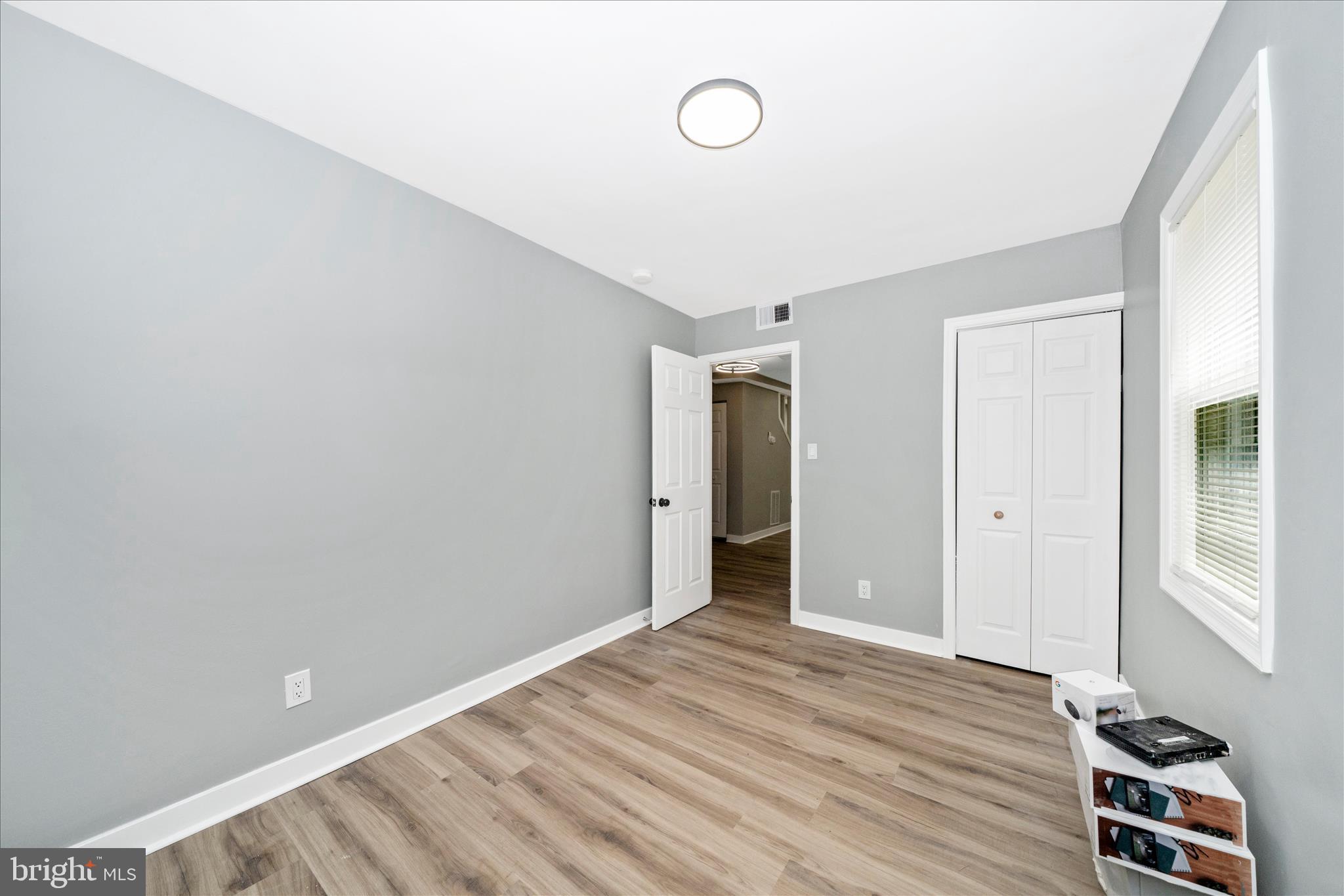 5027 Benning Road Southeast Washington, DC 20019 - Photo 26 of 57 a view of a room with wooden floor and bathroom