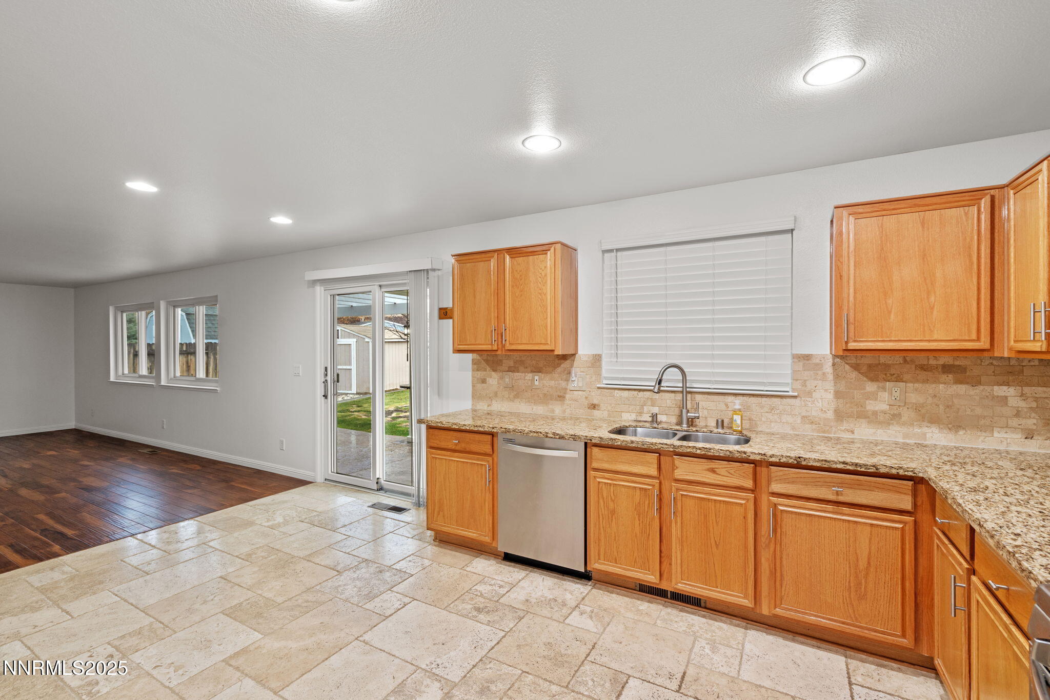 5455 Montego Court Reno, NV 89523 - Photo 13 of 36 a large kitchen with a sink and cabinets