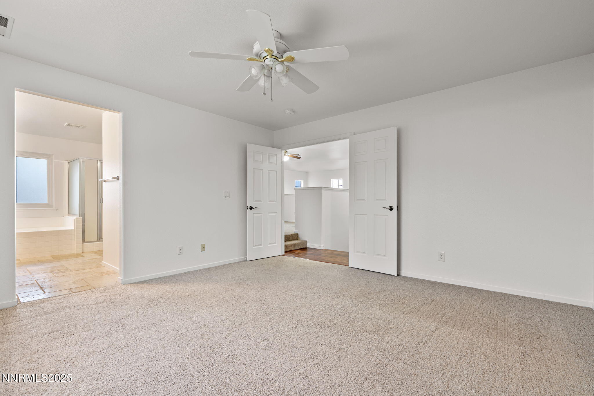 5455 Montego Court Reno, NV 89523 - Photo 22 of 36 an empty room with fan and entrance