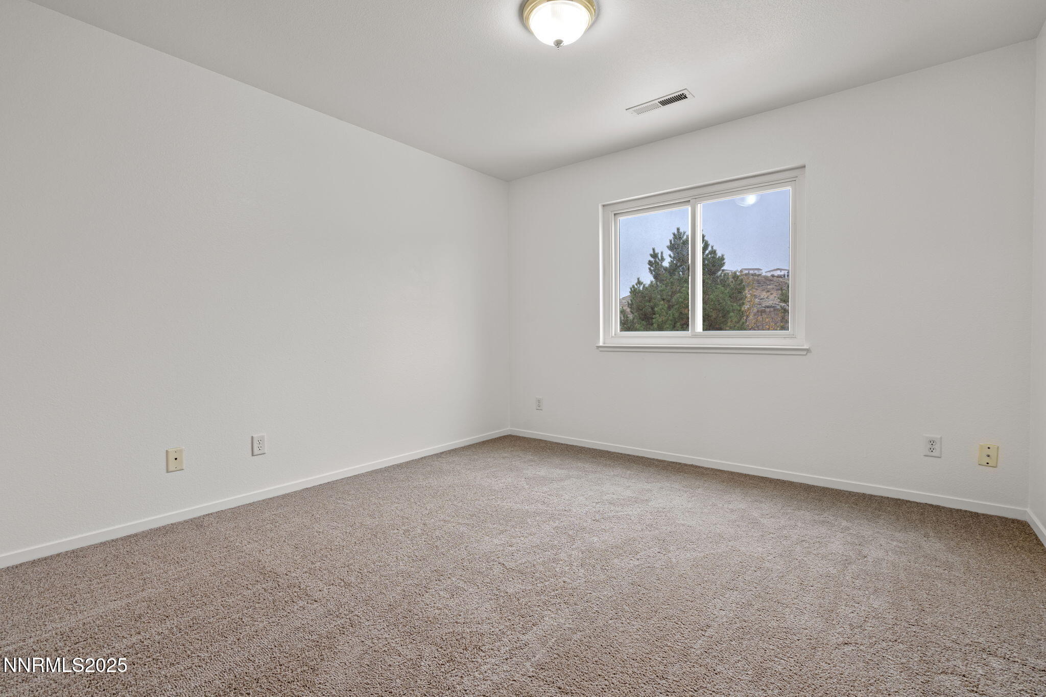 5455 Montego Court Reno, NV 89523 - Photo 26 of 36 an empty room with a window