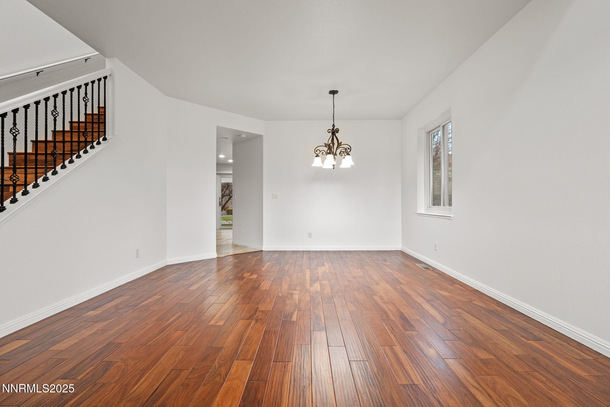 5455 Montego Court Reno, NV 89523 - Photo 3 of 36 a view of empty room with wooden floor and fan