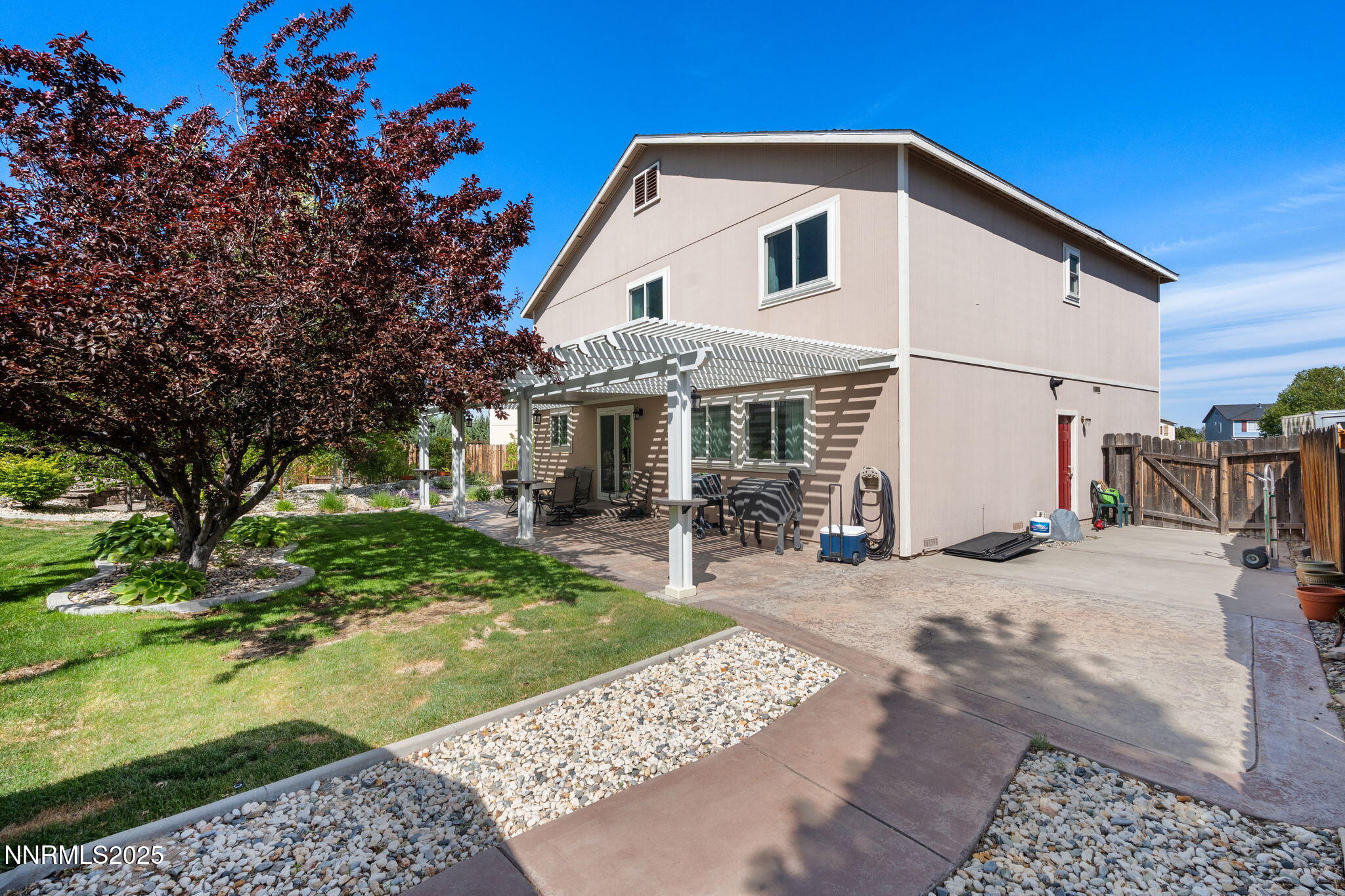 5455 Montego Court Reno, NV 89523 - Photo 33 of 36 a front view of a house with yard patio and green space