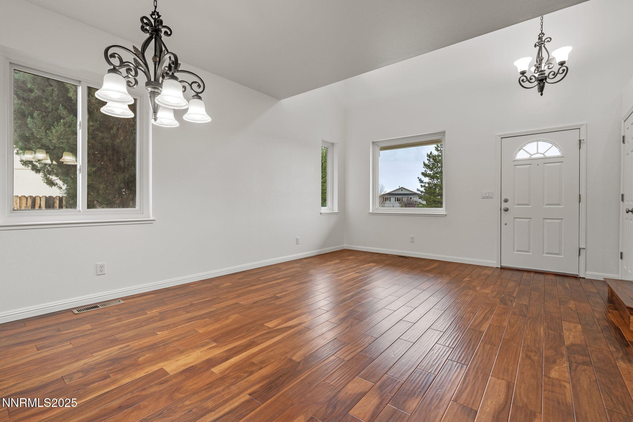 5455 Montego Court Reno, NV 89523 - Photo 4 of 36 a view of empty room with wooden floor and fan
