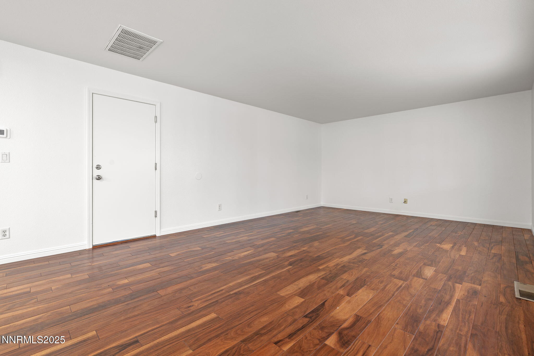 5455 Montego Court Reno, NV 89523 - Photo 8 of 36 a view of empty room with wooden floor