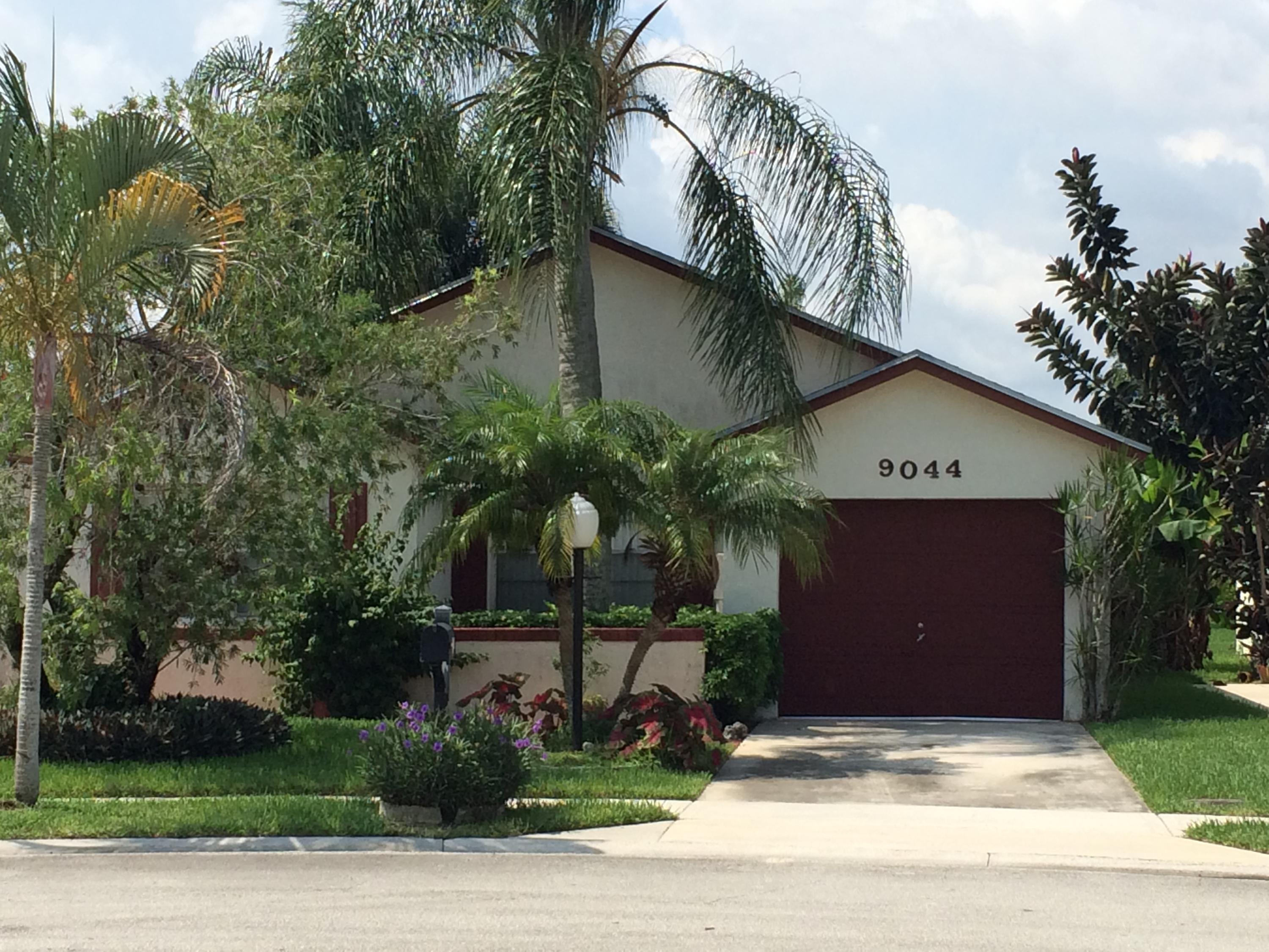 9044 Pine Springs Drive Boca Raton, FL 33428 - Photo 1 of 14 Front of Home