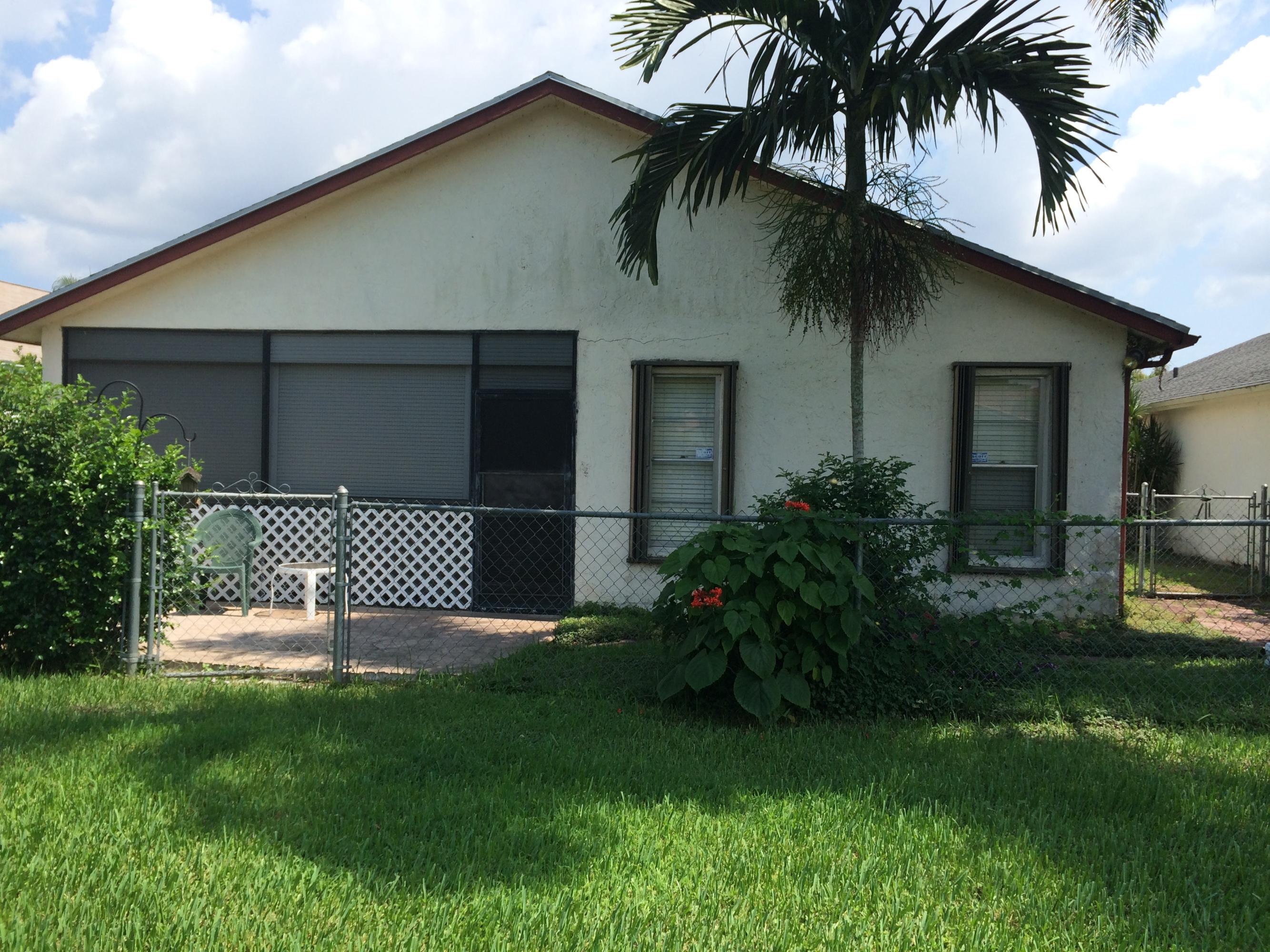 9044 Pine Springs Drive Boca Raton, FL 33428 - Photo 12 of 14 Rear View Of Home