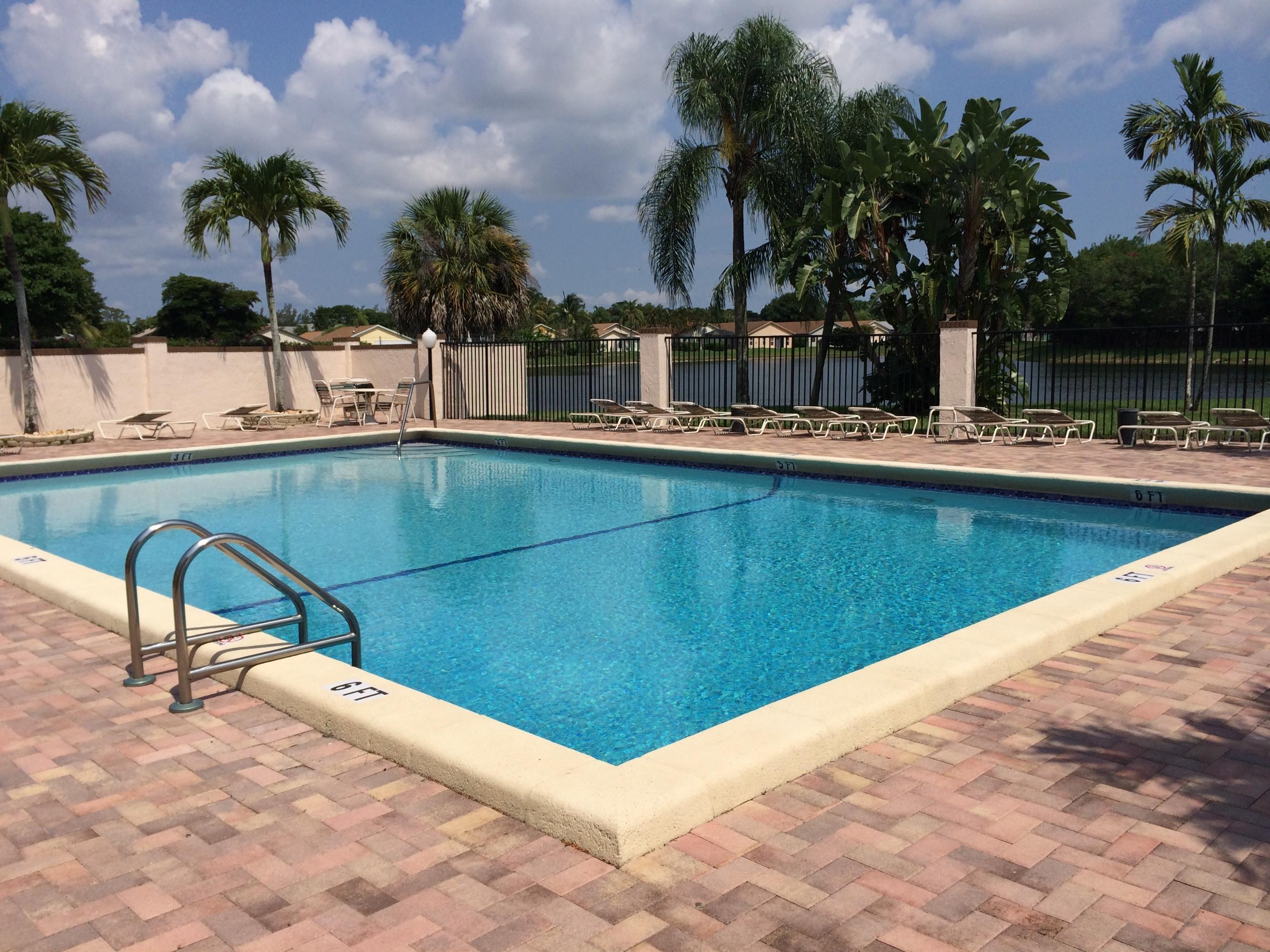 9044 Pine Springs Drive Boca Raton, FL 33428 - Photo 14 of 14 Waterfront Community Pool