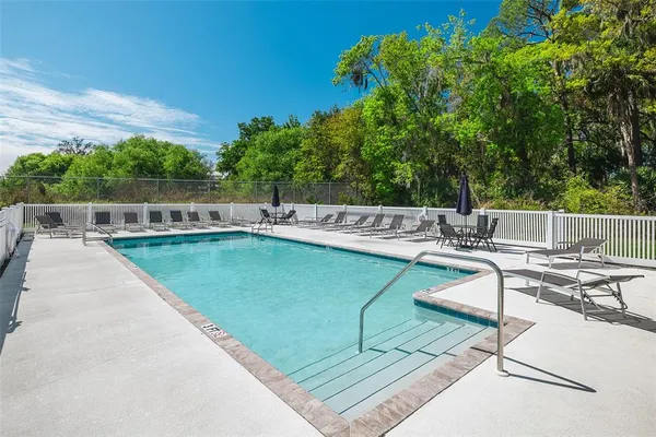 an aerial view of houses with outdoor space