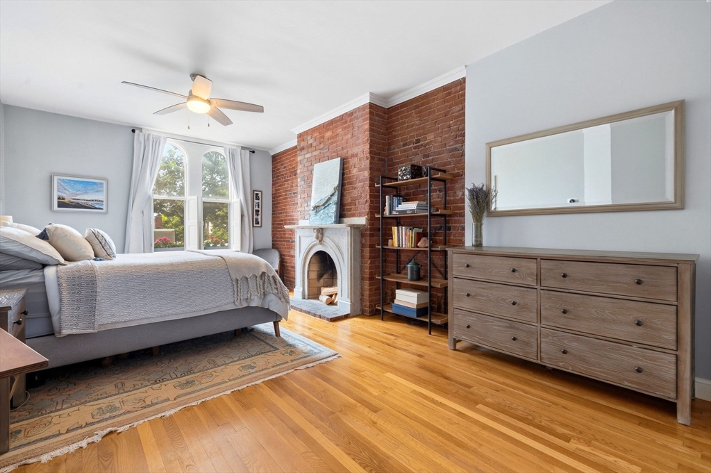 35 High Street, Unit 1 Boston, MA 02129 - Photo 6 of 33 a bedroom with a bed and a dresser