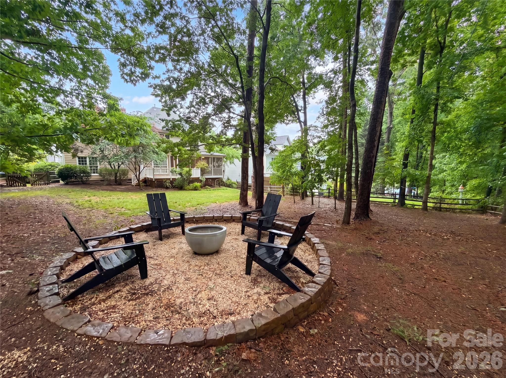 12341 Willingdon Road Huntersville, NC 28078 - Photo 16 of 17 a view of a park with bench and trees