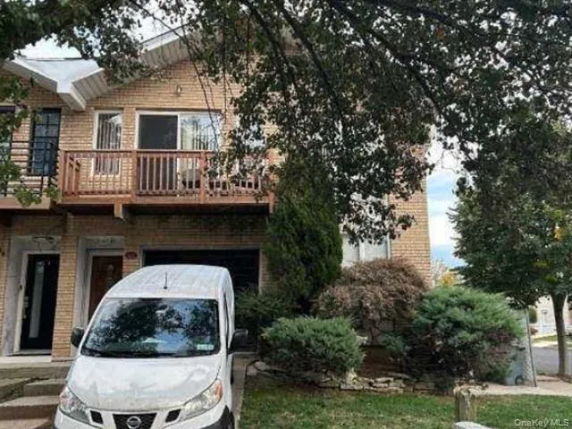 a house with trees in front of it