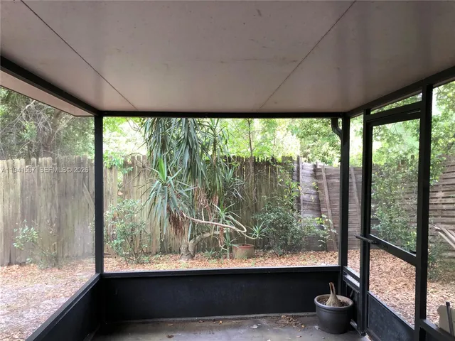 a view of a garden from a balcony