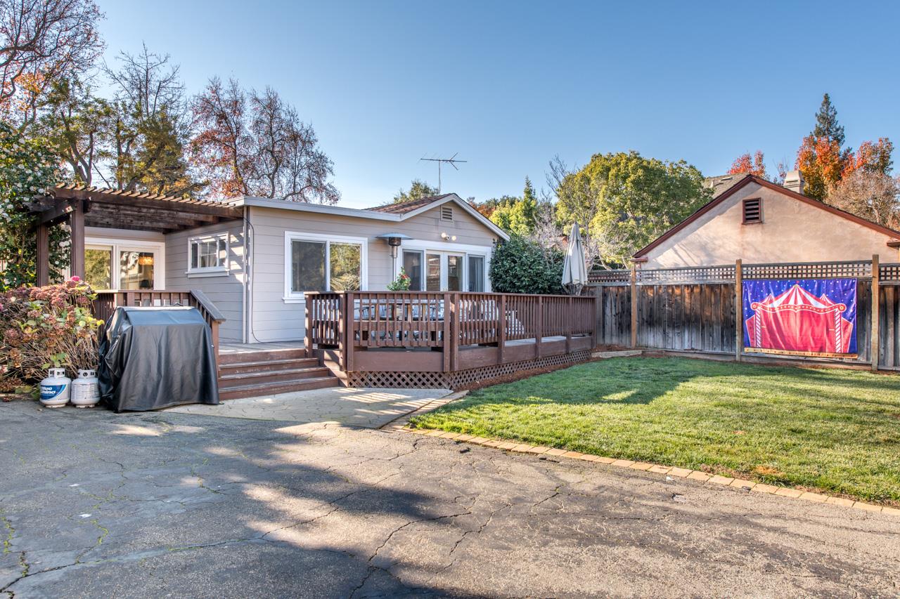 308 Princeton Road Menlo Park, CA 94025 - Photo 19 of 22 a view of backyard with a garden and deck