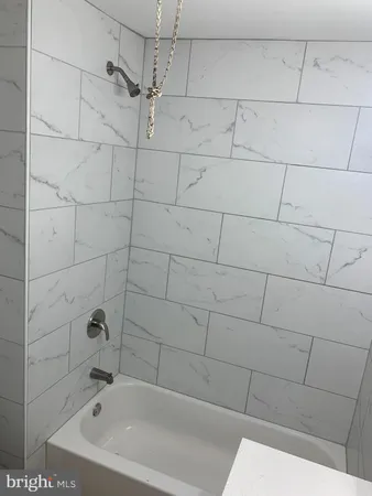 a bathroom with a bathtub