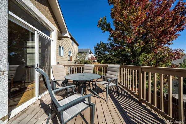 a view of a balcony with chairs