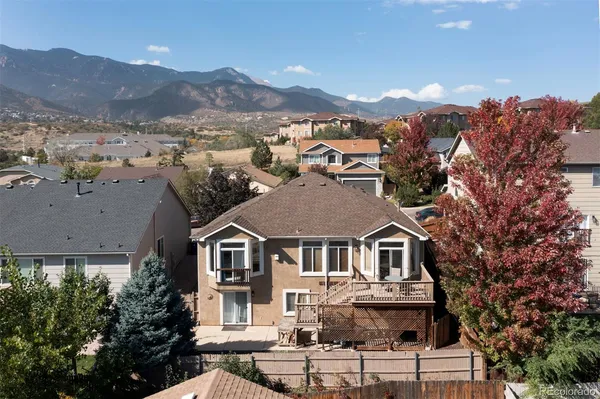 an aerial view of residential houses and trees