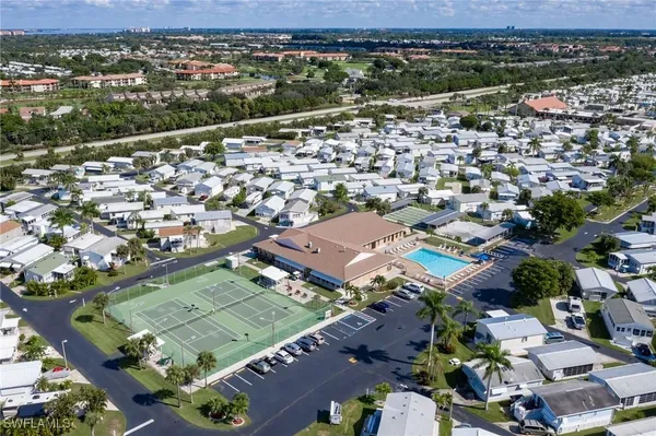 an aerial view of a city with lots of residential buildings
