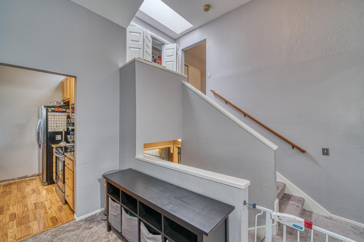 923 Linda Mar Boulevard Pacifica, CA 94044 - Photo 12 of 31 a view of kitchen with furniture and wooden floor