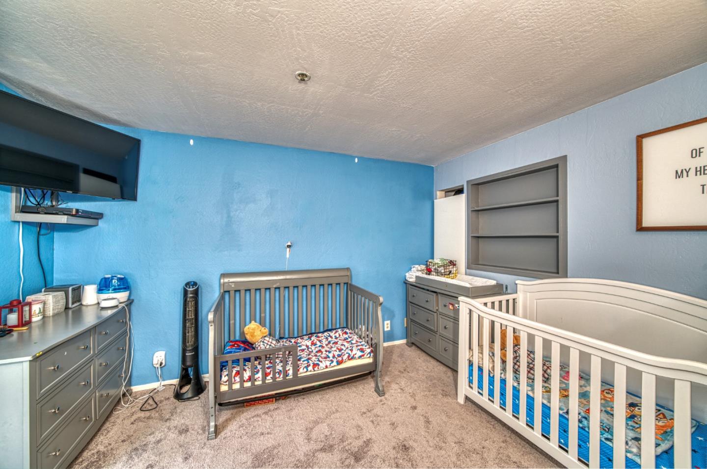 923 Linda Mar Boulevard Pacifica, CA 94044 - Photo 13 of 31 a bedroom with furniture and a window