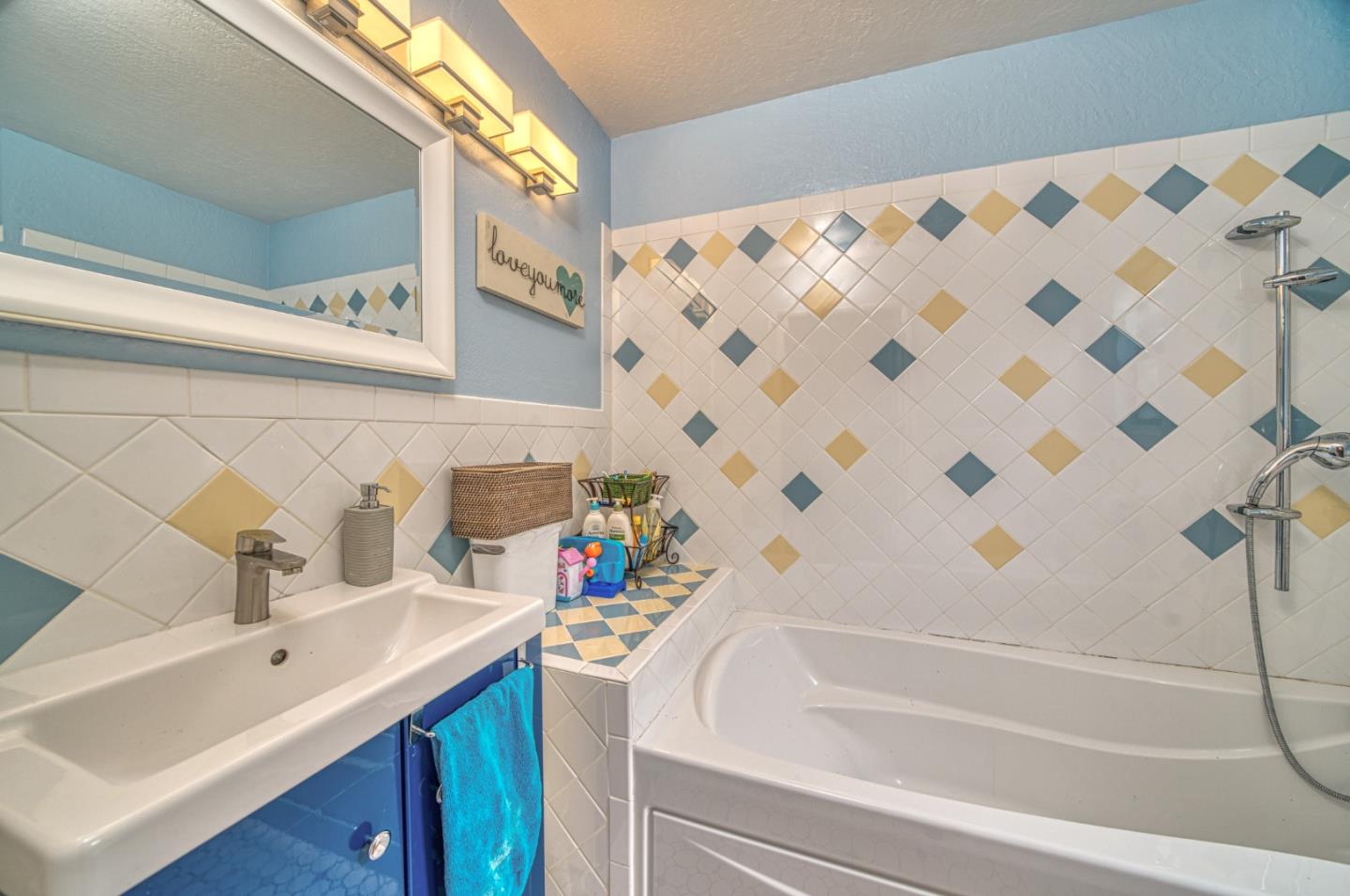 923 Linda Mar Boulevard Pacifica, CA 94044 - Photo 15 of 31 a bathroom with a sink and a bathtub