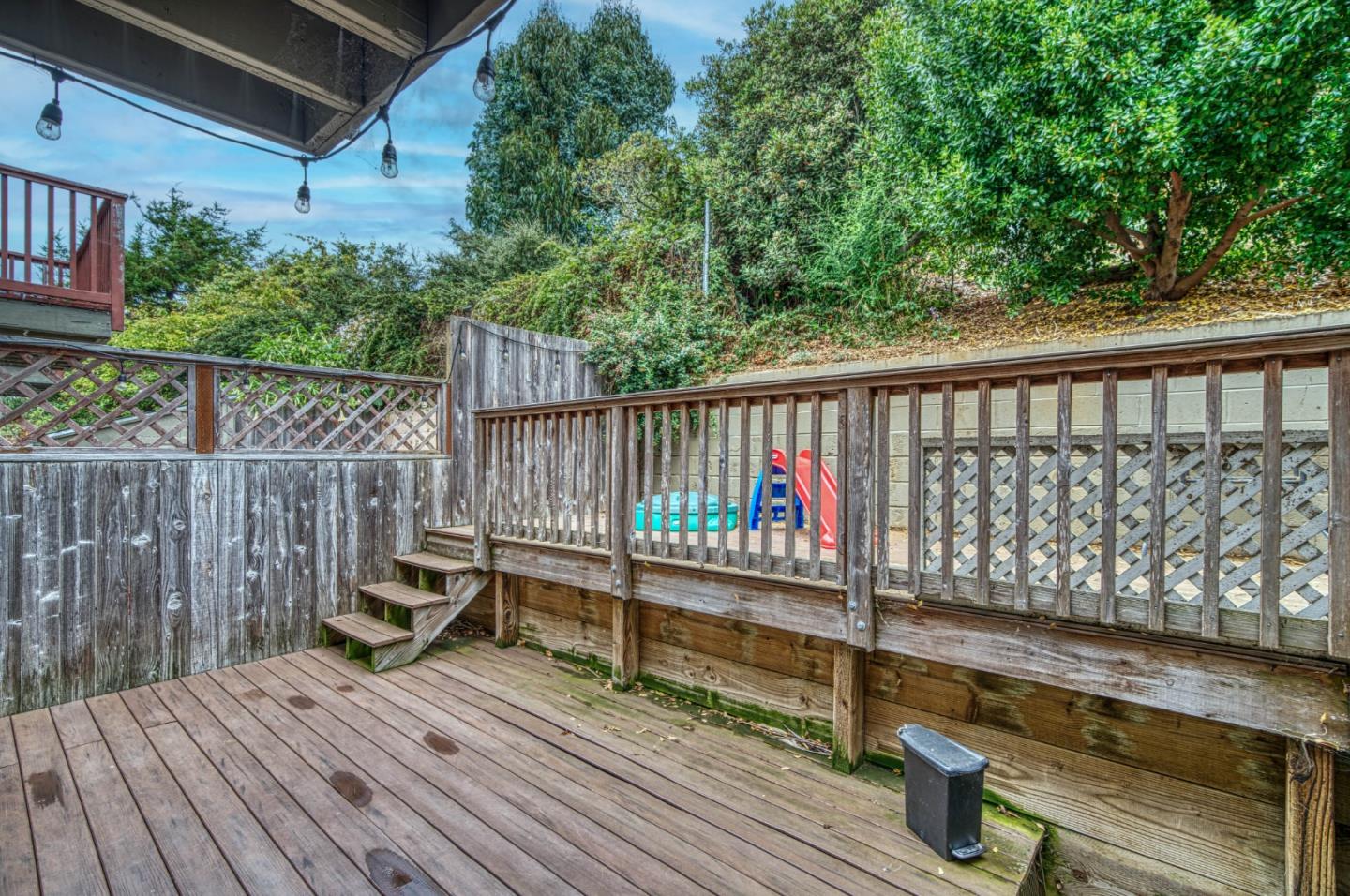 923 Linda Mar Boulevard Pacifica, CA 94044 - Photo 21 of 31 a view of deck with wooden floor and outdoor seating