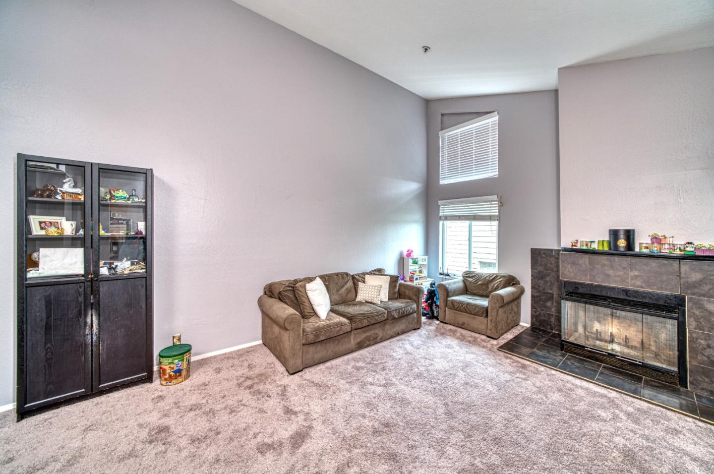 923 Linda Mar Boulevard Pacifica, CA 94044 - Photo 5 of 31 a living room with furniture and a fireplace