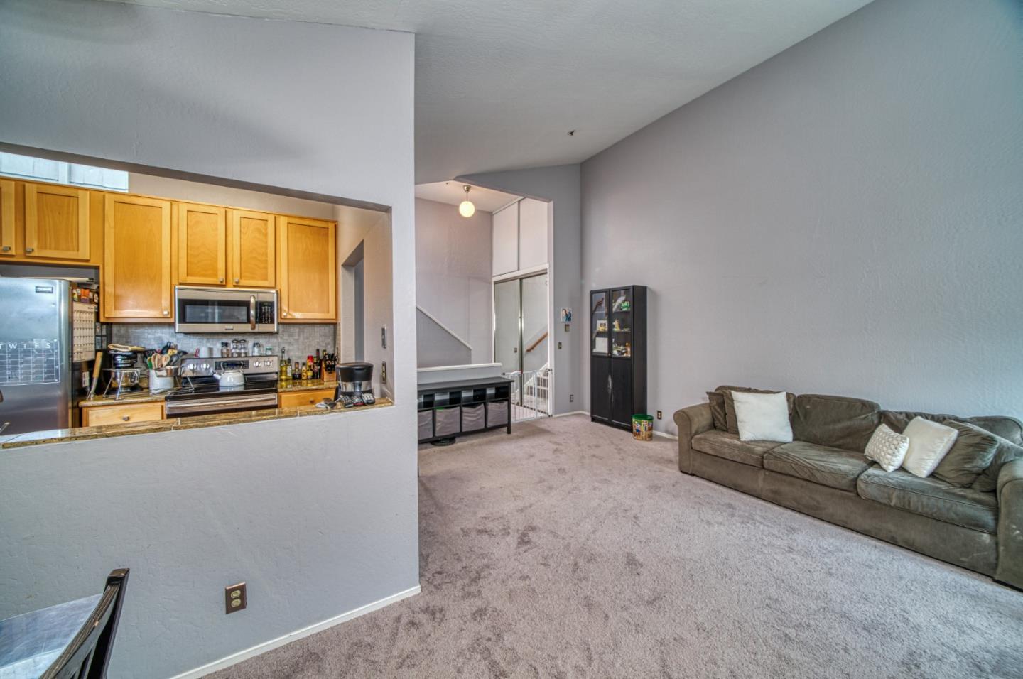 923 Linda Mar Boulevard Pacifica, CA 94044 - Photo 6 of 31 a living room with furniture and a large window