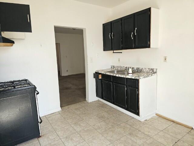 5421 West Main Street Monee, IL 60449 - Photo 5 of 13 a kitchen with stainless steel appliances granite countertop a stove and a refrigerator
