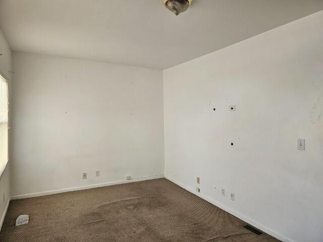 5421 West Main Street Monee, IL 60449 - Photo 10 of 13 an empty room with a workbench