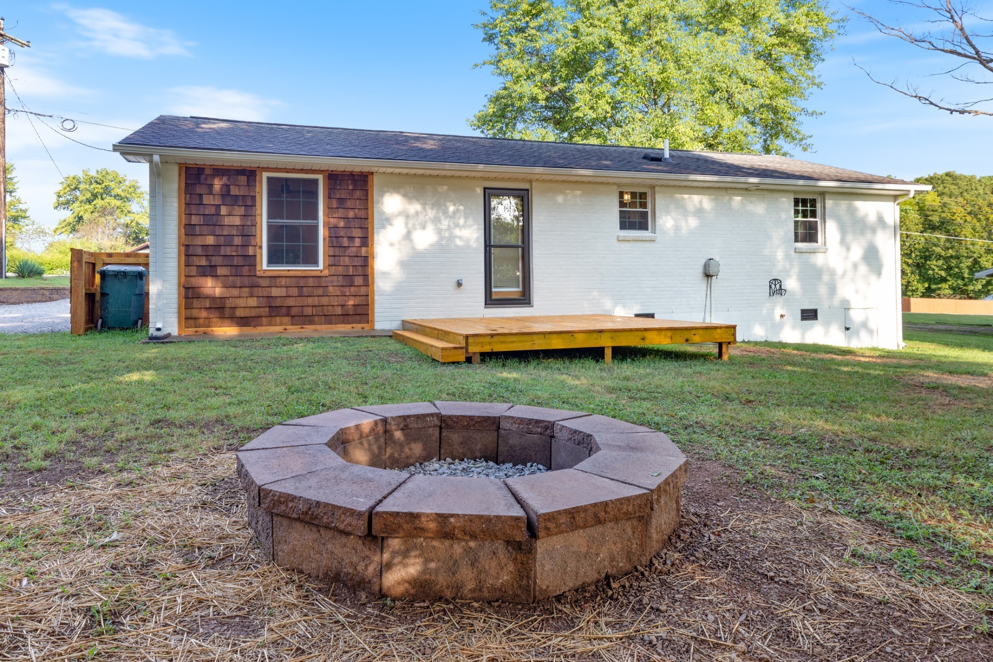 100 Short Street Dickson, TN 37055 - Photo 12 of 33 a view of a house with backyard and a patio