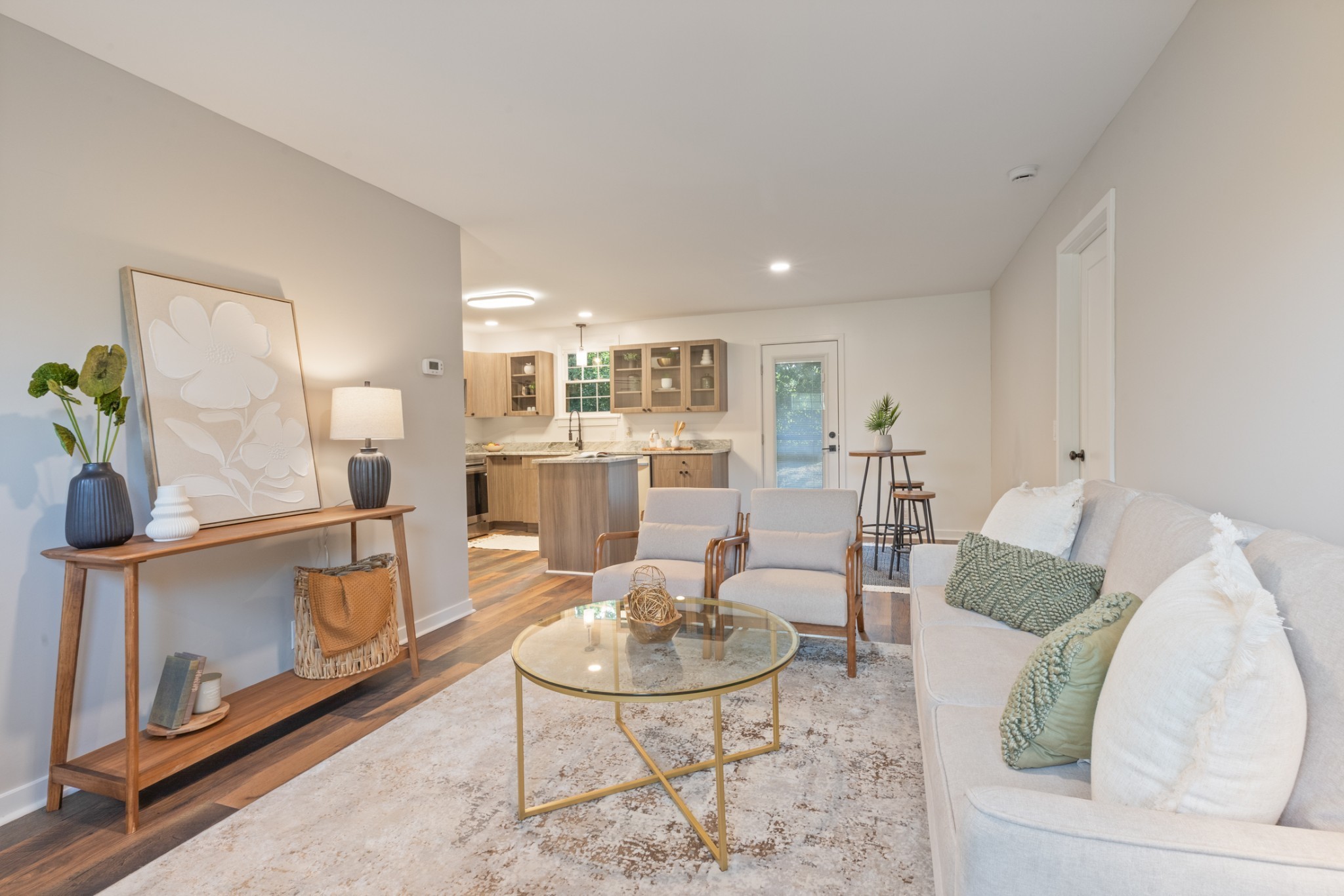 100 Short Street Dickson, TN 37055 - Photo 16 of 33 a living room with furniture and a dining table with kitchen view