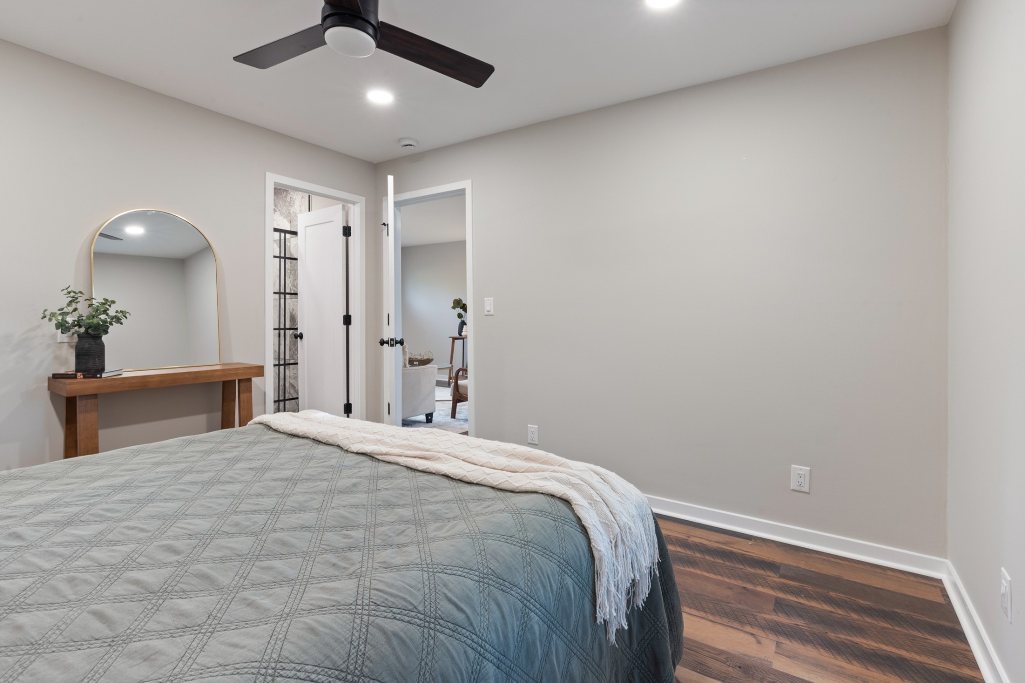 100 Short Street Dickson, TN 37055 - Photo 24 of 33 a bedroom with a large bed and a chandelier