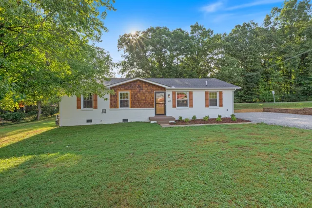 a house view with a garden space