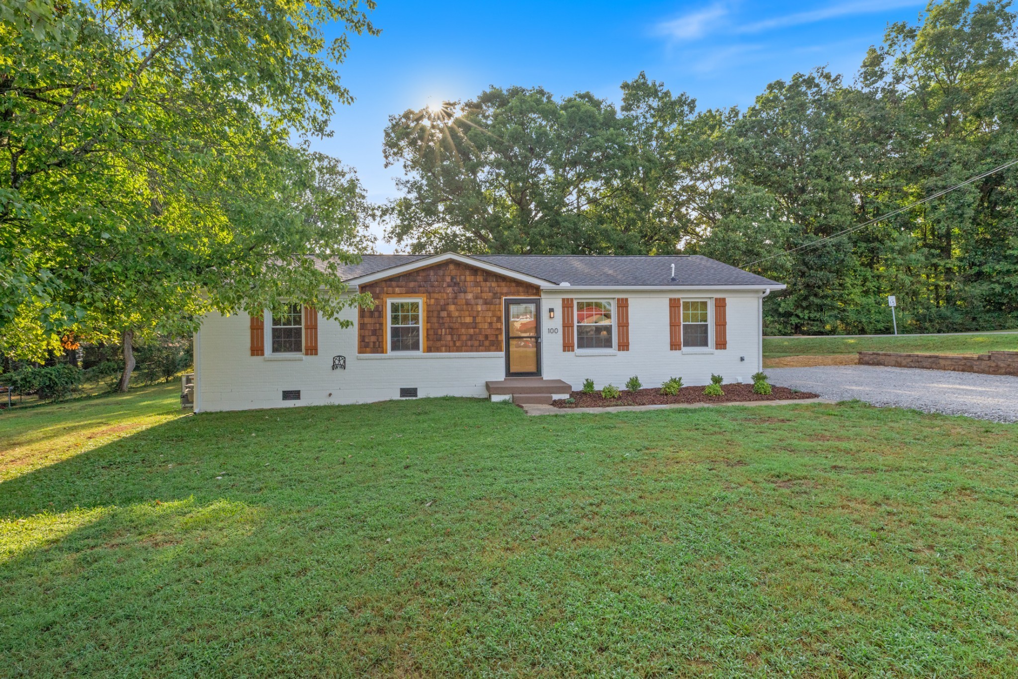 100 Short Street Dickson, TN 37055 - Photo 3 of 33 a house view with a garden space