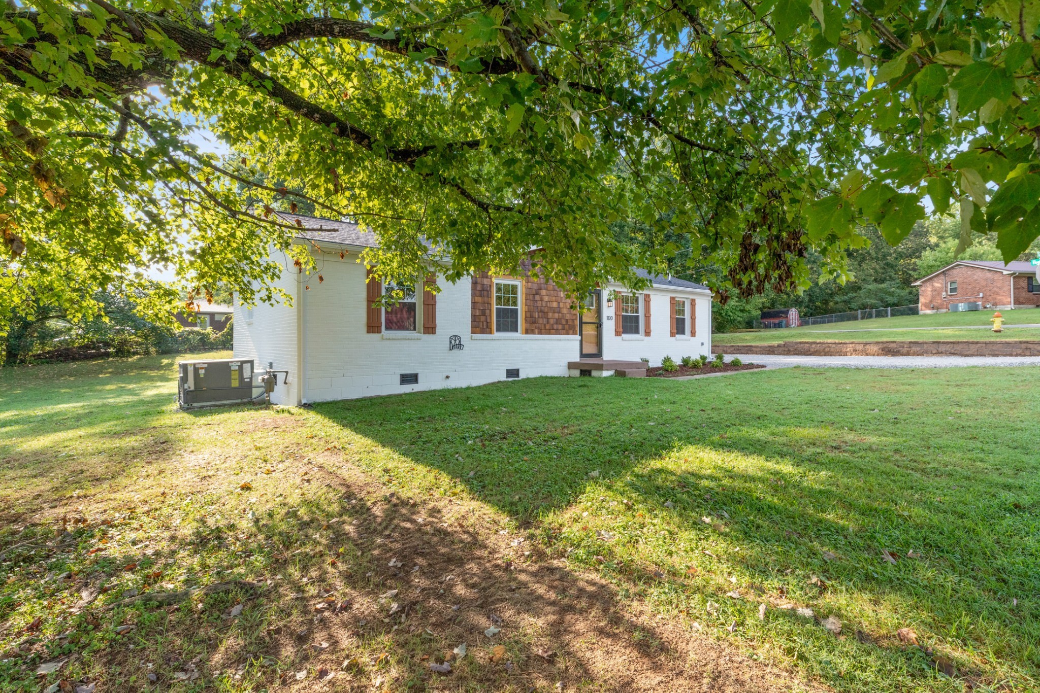 100 Short Street Dickson, TN 37055 - Photo 6 of 33 a house view with a garden space