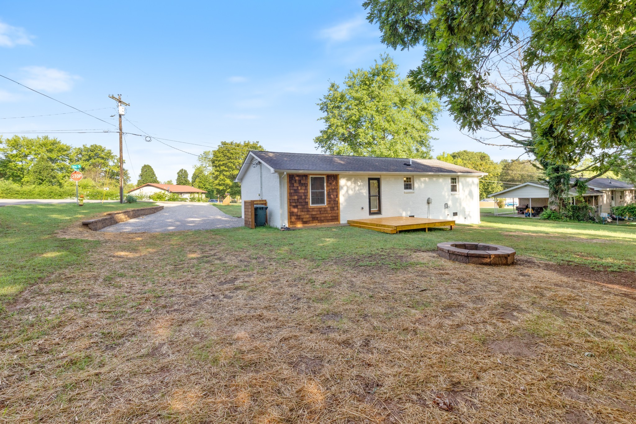 100 Short Street Dickson, TN 37055 - Photo 9 of 33 a view of a house with backyard and trees