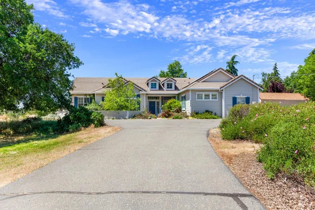 a kitchen with a sink stove and refrigerator