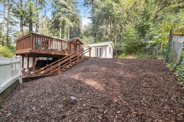 a view of mountain view with lots of trees