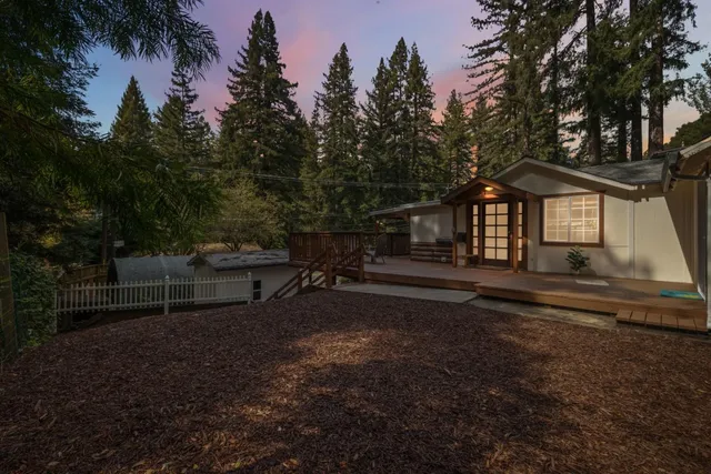 a view of backyard with green space