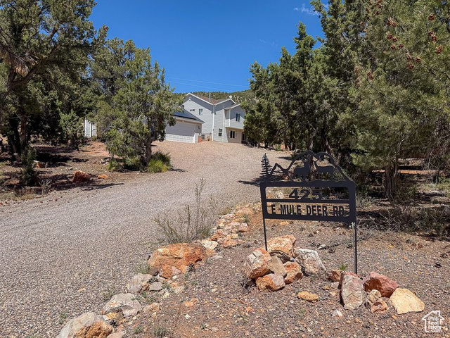 425 East Mule Deer Road Central, UT 84722 - Photo 41 of 72 View of front facade featuring dirt driveway and a garage