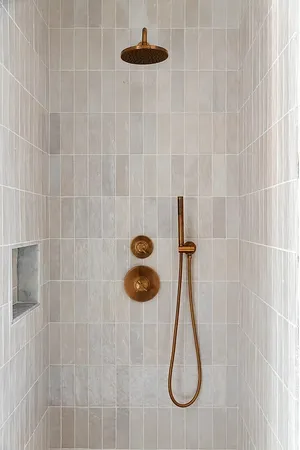 a bathroom with a sink mirror and a toilet