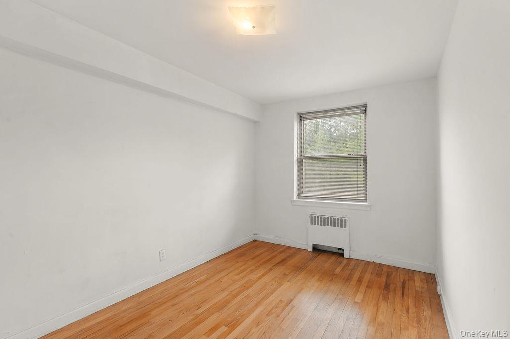 485 Bronx River Road, Unit A21 Yonkers, NY 10704 - Photo 12 of 18 an empty room with a window