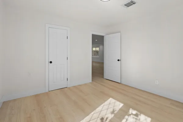 an empty room with windows