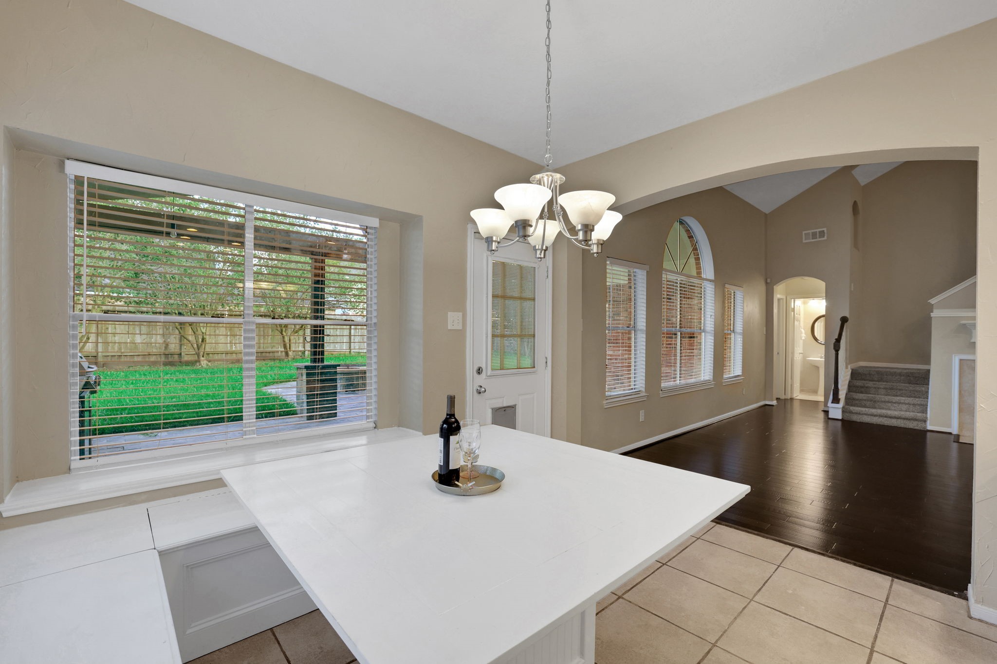 23207 Olive Ridge Court Katy, TX 77494 - Photo 13 of 46 a view of a livingroom with a furniture window wooden floor and garden view